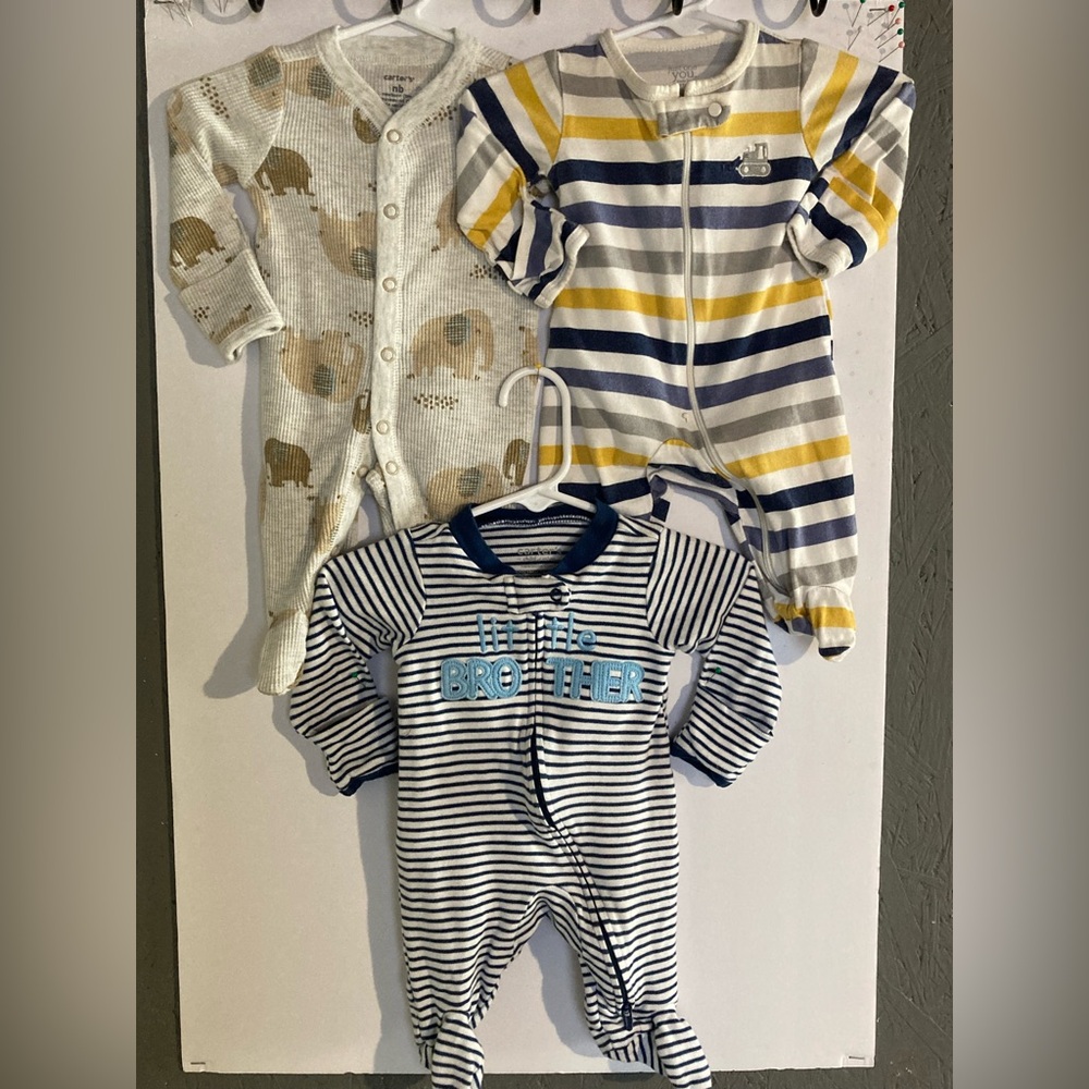 Multiple Carter’s Newborn footed Jammies